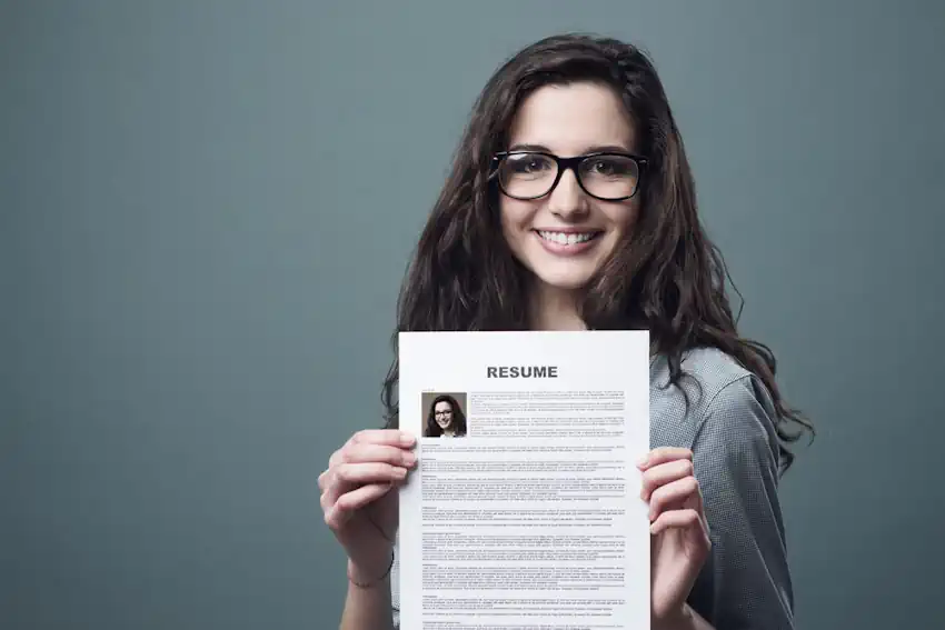 A Young Lady Holding Her Resume