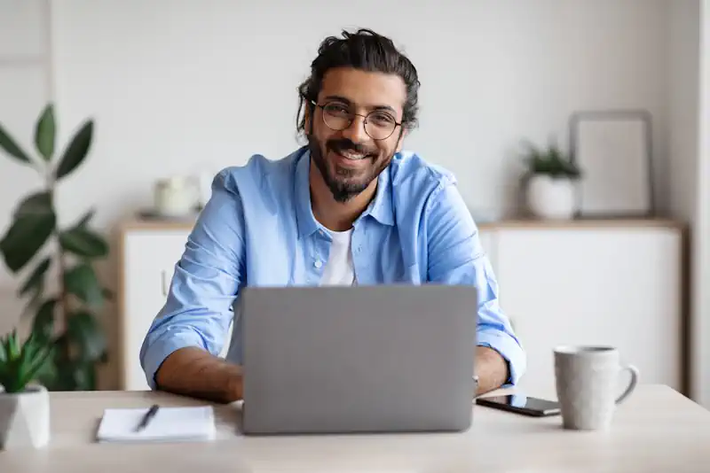 Happy Entrepreneur in His Home Office